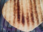 Una foto de grill de gas