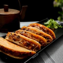 A picture of Cheesy Potato Tacos.