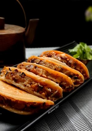 A picture of Cheesy Potato Tacos.