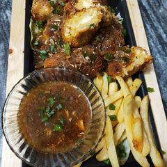 A picture of Sizzler chessy saucey chana kabab.