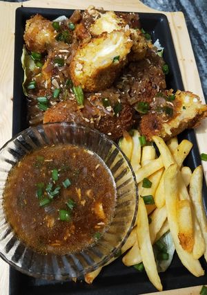 A picture of Sizzler chessy saucey chana kabab.