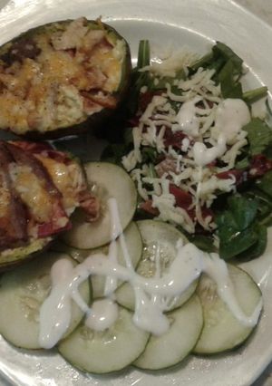 A picture of Low carb keto cheese and bacon avacado boats.