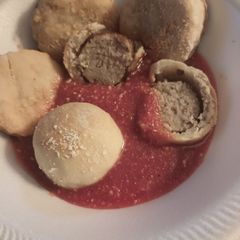 A picture of Meatball Bites and Crackers with Sauce.