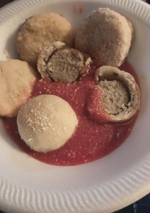 A picture of Meatball Bites and Crackers with Sauce.