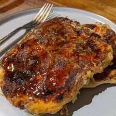 A picture of Eggy spicy french toast with gochujang sauce.