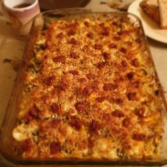 A picture of Cauliflower cheese with creme fraiche, mustard and kale.