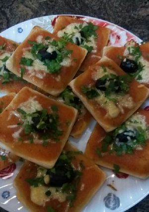 صورة لوصفة بيتزا بالعجينة المورقة