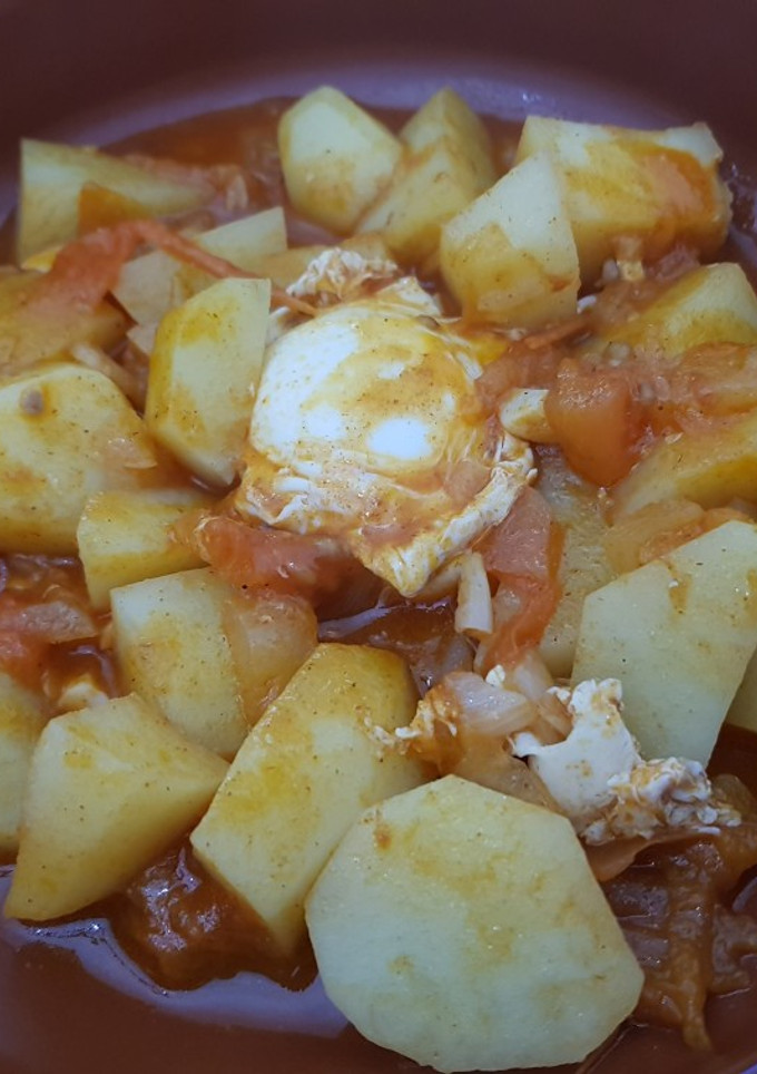 Una foto de Papas guisadas con huevo