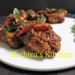 A picture of Chicken Ghee Roast.