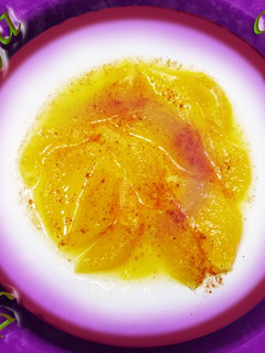Una foto de Naranja con azúcar y canela