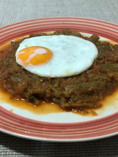 Una foto de Tagarninas con tomate y huevo 🍳