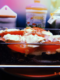 Una foto de Lombarda con pollo, tomate y queso de cabra