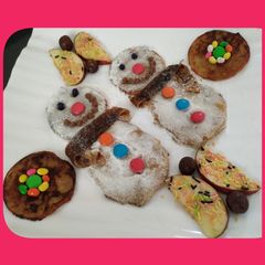 A picture of Snowman Apple Pancakes.
