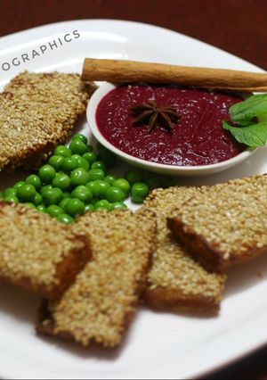 A picture of Sesame Chicken Toast with Beetroot-star anise dip.