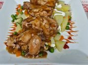 Una foto de pollo al tamarindo