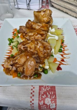 Una foto de Alitas Coreanas
