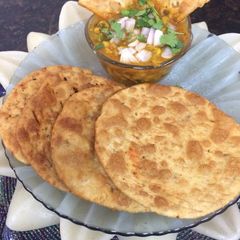 A picture of Oats Pakwan with dal.