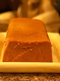 Una foto de Budín de pan con dulce de leche