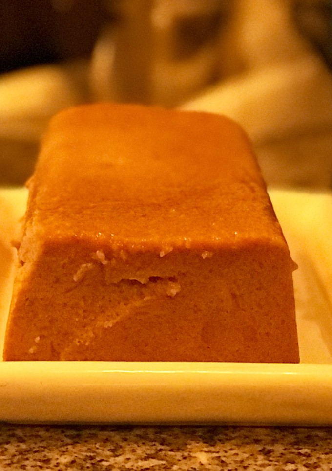 Una foto de Budín de pan con dulce de leche