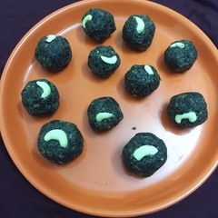 A picture of Healthy Millets sesame almond ladoo.