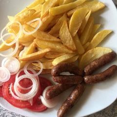 Chips and sausages for breakfast A picture of Chips and sausages for breakfast.