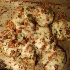 A picture of Bacon and cheese smashed potatoes.