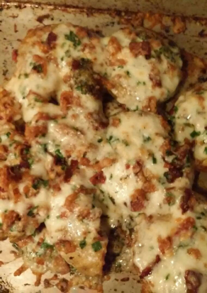 A picture of Bacon and cheese smashed potatoes.
