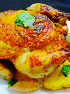 A picture of Masala roast whole Chicken.