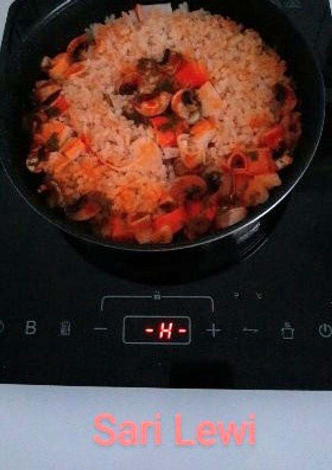 Una foto de Arroz con compañía en Placa de inducción (9 ingredientes)