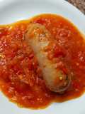 Chorizo a la pomarola y choripan de chorizo a la pomarola