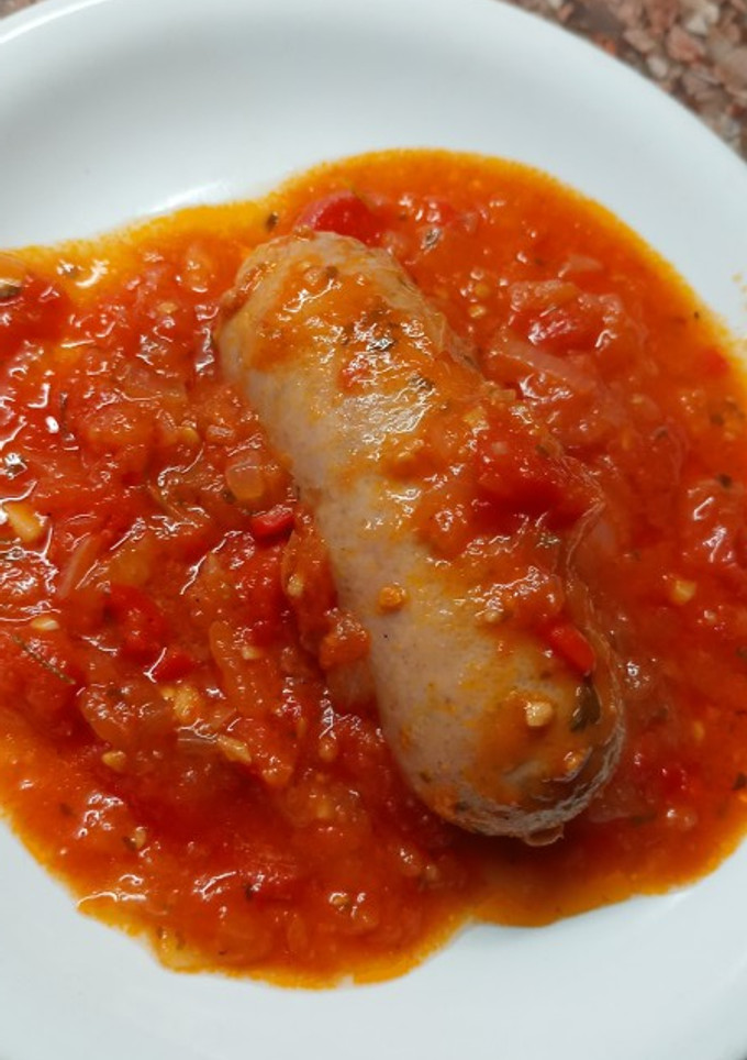 Una foto de Chorizo a la pomarola y choripan de chorizo a la pomarola