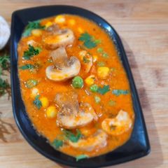 A picture of Corn mushroom masala.