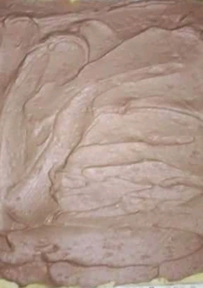 Una foto de Crema de chocolate para rellenar tortas de cumpleaños