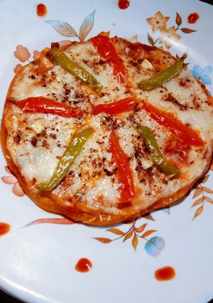 A picture of Healthy tasty homemade wheat flour Tawa pizza.