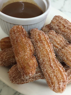 A picture of Churros with Chocolate Dipping Sauce.