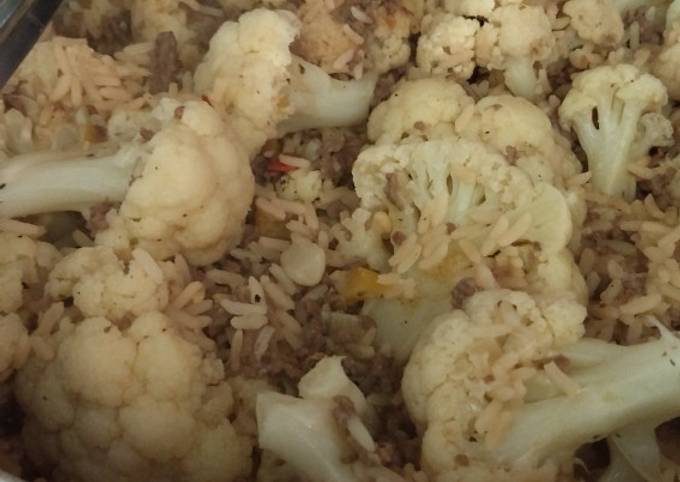 Dirty rice covered in cauliflower