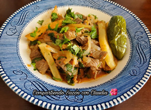 Una foto de Bistec con papas en su jugo🌺