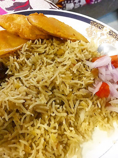 A picture of Channy ki daal waly rice with aaloo pakora.