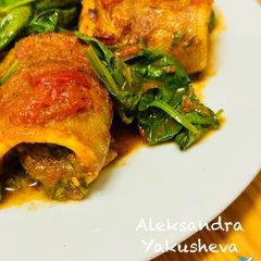 Cod rolls with tomatoes and spinach A picture of Cod rolls with tomatoes and spinach.