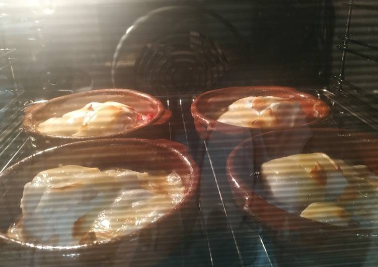 Bacalao gratinado (alioli) con base de pimientos rojos