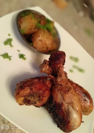 Una foto de Pollo al horno con papas