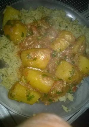 A picture of Rice with Nodules and Matoke stew.