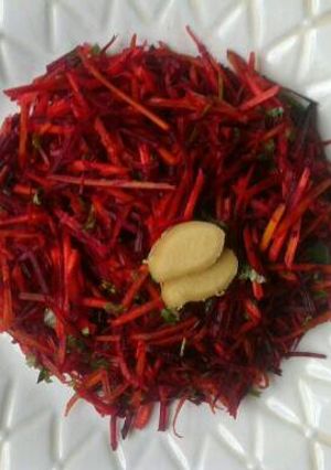 Una foto de Ensalada Cruda de Zanahoria, Zapallo y Beterraga