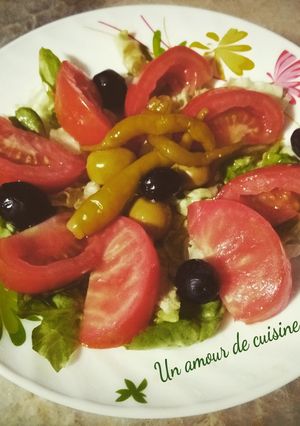 Une photo de Salade verte et tomate