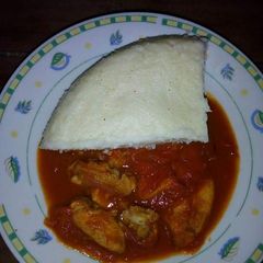 A picture of Beef Stew with Ugali.
