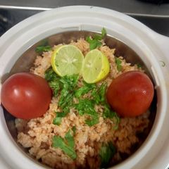 A picture of Spicy Nimbu Tomato Rice.