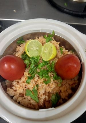 A picture of Spicy Nimbu Tomato Rice.