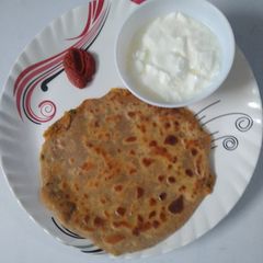 A picture of Stuffed Aloo Paneer Paratha.