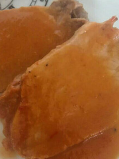 Una foto de Lomo en salsa de naranja
