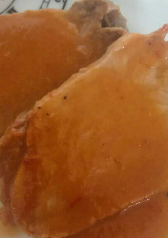 Una foto de Lomo en salsa de naranja